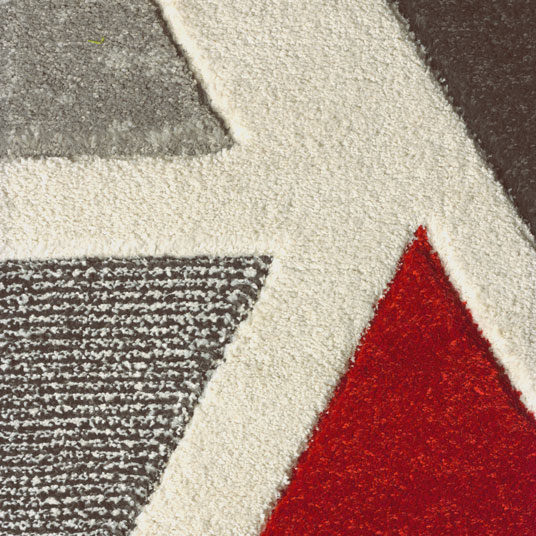 Tapis de salon design - Seventies - Triangles multicolores - gros plan