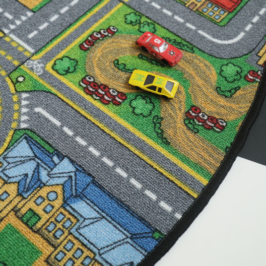 Tapis rond de jeu enfant circuit de voiture ville - gros plan