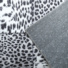 Tapis toucher soft - Imprimé léopard - Patchwork noir et blanc - envers