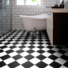 Sol vinyle Happy Days carrelage damier diagonal noir et blanc - salle de bain