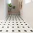 Sol vinyle textile conomique dalles de sol avec cabochon noir et gris - couloir