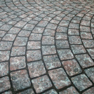 Moquette Stand imprimée Pavés à la Parisienne avec motif pavé gris en arcs élégants