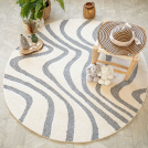 Ambiance bord de mer avec le tapis en relief Belle-Île - Vagues grises et crème