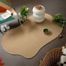 Tapis contemporain Mahé naturel de forme organique, teinte naturelle et déco contemporaine