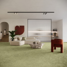 Tapis sur mesure vert kaki Re-cycle dans un salon, confort et engagement écoresponsable