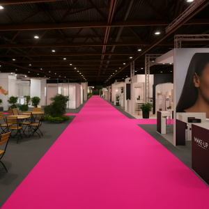 Moquette Orotex Revexpo Rose posée dans un espace de circulation événementiel