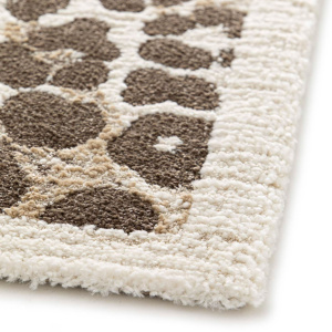Tapis de salon Sauvage crème motif léopard, bordure soignée et contour animalier élégant