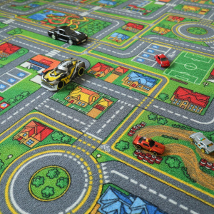 Moquette de jeu enfant circuit de voiture ville avec véhicules sur les routes