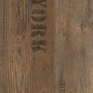Sol PVC First effet parquet marqué chêne bruni, rendu bois vintage avec marquages imprimés