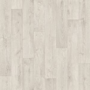Sol vinyle Batimax Tavel T19 imitation parquet bois blanc grisé, avec des lames décalées aux veinages discrets et aux nuances naturelles