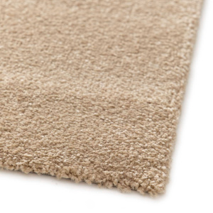 Gros plan sur la texture du tapis Stone marron clair Motifs organiques