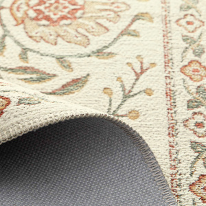 Envers et détail du tapis Minia Pêche en tissu chenille recyclé, souple et facile d’entretien