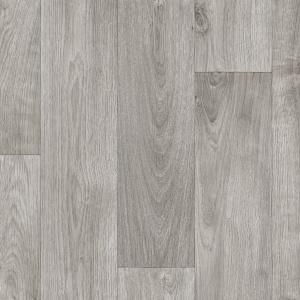Sol vinyle Batimax Tavel T17 imitation parquet bois gris, avec des lames décalées aux veinages naturels et aux nuances cendrées