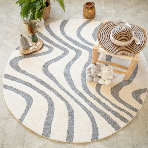 Ambiance bord de mer avec le tapis en relief Belle-Île - Vagues grises et crème