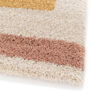 Détail angle tapis Good Mood esprit solaire et doux