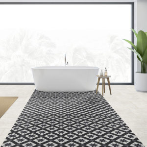 Dalle vinyle - Gerflor Senso Unik - Cordoba black dans une salle de bain épurée avec baignoire îlot