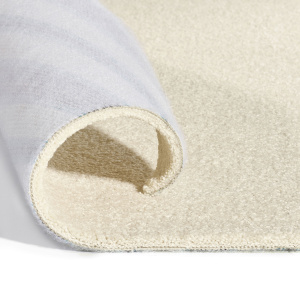Moquette ultra douce Kawaii crème, revêtement souple replié avec envers textile visible