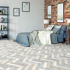 Sol Vinyle First - Imitation parquet usé chevron coloré - Chambre