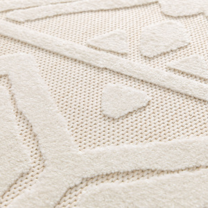 Texture du tapis extérieur et intérieur Brasilia crème, avec tissage plat et détails ethniques