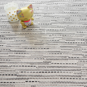 Revêtement de sol tissé plat blanc Bornéo avec motif structuré et ambiance minimaliste