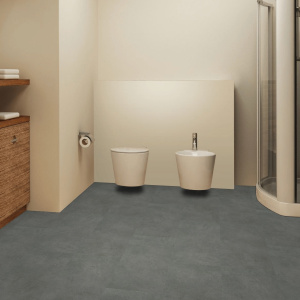 Dalles PVC - Click à plat 0,55 - effet béton gris foncé dans une pièce humide