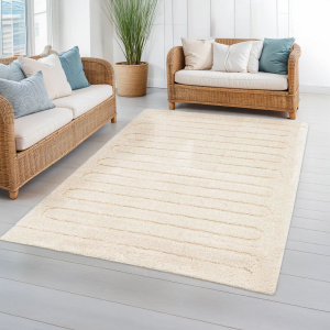 Tapis Zig-Zag crème dans salon lumineux ambiance naturelle rotin