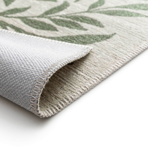 Tapis souple en tissu chenille recyclé Matcha Forêt, détail du tapis replié et du motif végétal vert