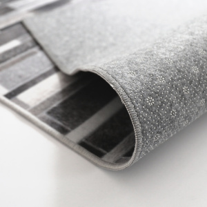 Tapis toucher soft - Imprimé peau de vache - Parement gris - envers