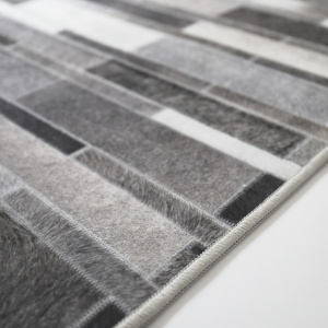 Tapis toucher soft - Imprimé peau de vache - Parement gris - Tranche