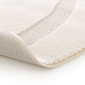 Tapis rond de salon en relief - Belle-île - Vagues écru et crème - envers