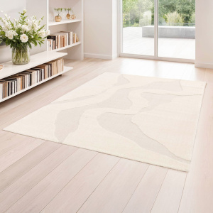 Tapis Stone crème intérieur chaleureux au motif fluide et enveloppant