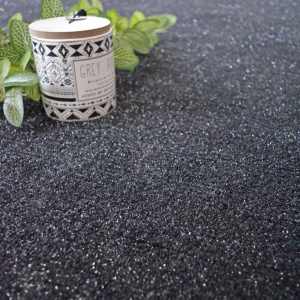 Moquette Flash Noir pailletée gros plan sur fibres brillantes et profondes