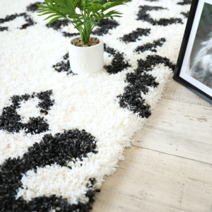 Tapis salon à poils longs - Wild animal noir et blanc cassé - vue de près