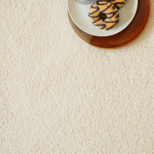 Détail moquette Cocoon Beige avec surface moelleuse et ambiance chaleureuse