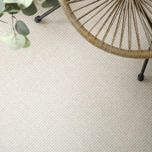 Moquette tissé plat Yoga Blanc fleur de coton avec plante et roue déco dans une ambiance naturelle