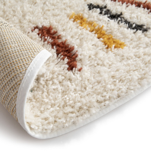 Tapis rond chambre d'enfant berbère Adel Beige et traits multicolore avec finition soignée et texture shaggy