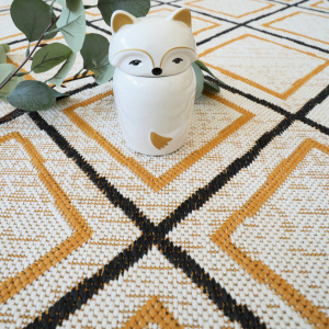 Tapis d'extérieur ou de salon - Motifs losanges - Jaune et noir - gros plan
