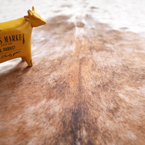 Tapis peau de bête imprimé HD - Imitation vache tachetée claire - Marron et blanc - gros plan