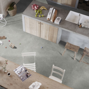 Sol vinyle textile aspect marbre gris dans une salle à manger contemporaine