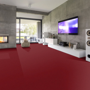 Ambiance chaleureuse et design avec sol en moquette velours rouge Loft Résist