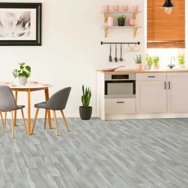 Sol Vinyle First - Imitation parquet gris clair - Effet argenté - Cuisine