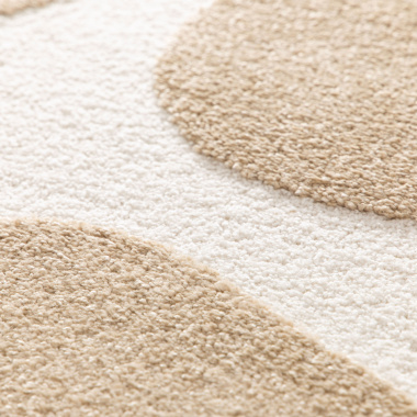 Tapis Flower Power marron clair, détail du tissage et relief des fleurs