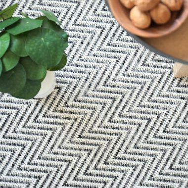 Moquette tissé plat Java chevron blanc - gros plan