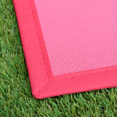 Vue de la finition en coin du Tapis PVC tressé Rose Corail