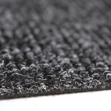 Zoom sur la texture bouclée de la dalle moquette anthracite