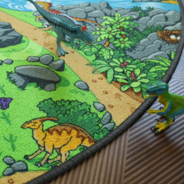 Tapis rond de jeu enfant circuit volcans et dinosaures - vue de près