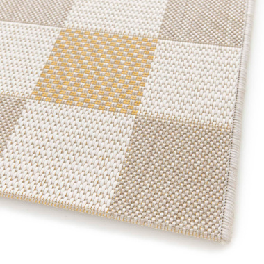 Détail du bord du tapis Andy, tissage recyclé beige et ocre, design contemporain