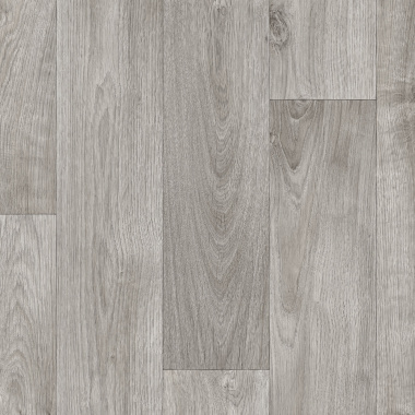 Sol vinyle Batimax Tavel T17 imitation parquet bois gris, avec des lames décalées aux veinages naturels et aux nuances cendrées