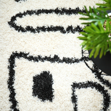 Tapis de salon à poils longs - Line art - Noir et blanc cassé - Vue de haut