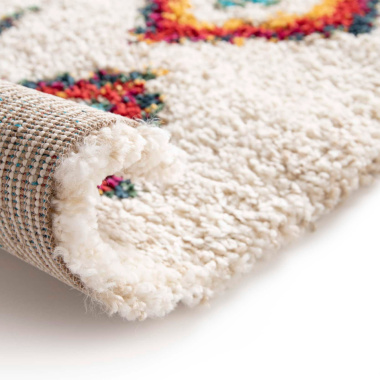 Gros plan sur le tapis Azilal multicolore, tissage berbère épais